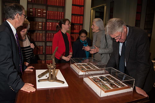 Visitors discussing the objects on display