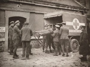 Loading an ambulance for evacuation