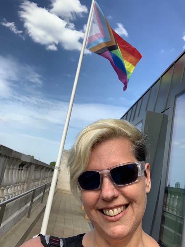 Ginny with Pride flag